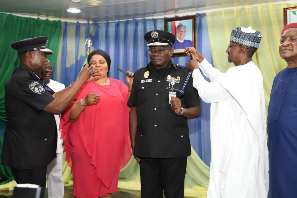 FOUR HUNDRED AND SIXTY-FIVE POLICE OFFICERS GET PROMOTIONS 