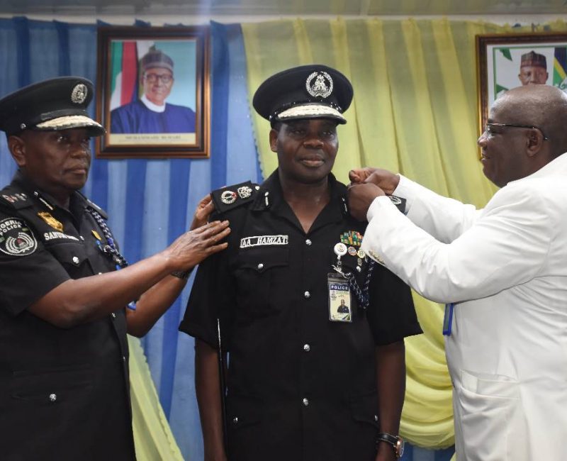 FOUR HUNDRED AND SIXTY-FIVE POLICE OFFICERS GET PROMOTIONS